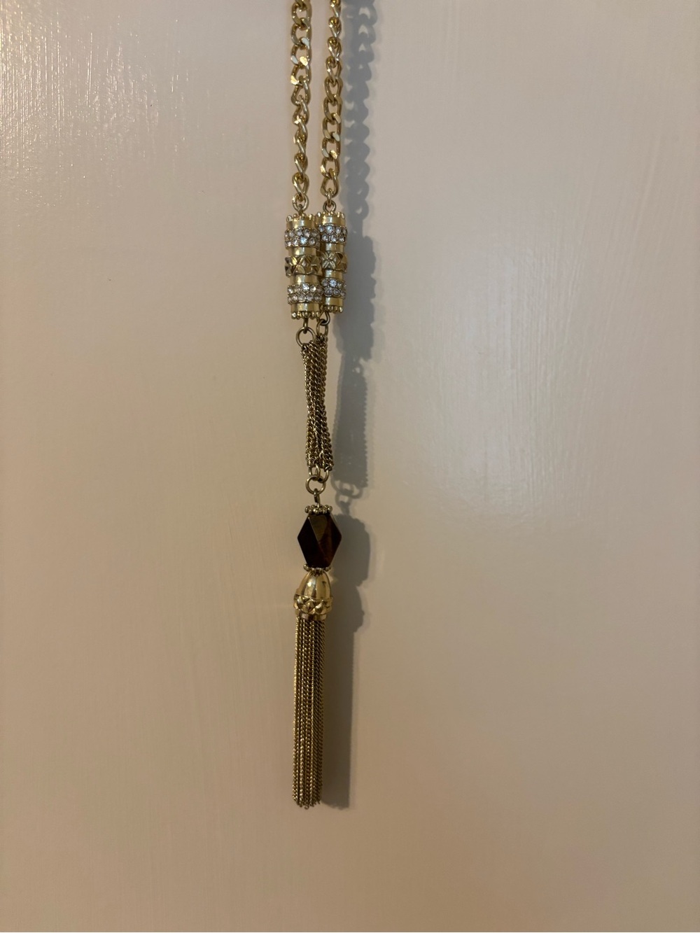 Gold Tassel Pendant Necklace with Dark Brown Crystal Accent